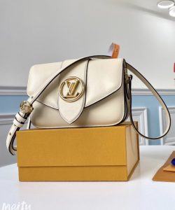 LOUIS VUITTON Pont 9. Authentic quality luxury bag crafted in genuine leather comes with authenticity card, dust bag and gift bag. Elevate your style with sophistication and grace. The LV Pont 9 handbag features elegantly structured and gracefully curved lines, crafted from luxurious smooth leather. A timeless House signature, the LV Circle, has been reimagined by the creative mind of Nicolas Ghesquière, embellishing both the bag's flap and the buckle of its adjustable strap. Exuding a touch of hidden elegance, the interior surprises with a colored leather lining and a Monogram Flower magnetic closure discreetly placed beneath the flap. - KRIS + KIKO LOUIS VUITTON Pont 9. Original Quality Bag including gift box, literature, dust bag, authenticity card. The structured yet curved lines of the LV Pont 9 handbag are fashioned from smooth leather. The LV Circle, a classic House signature reinterpreted by Nicolas Ghesquière, adorns the bag’s flap and the adjustable strap’s buckle. Hidden features such as a colored leather lining and Monogram Flower magnetic closure on the flap’s underside bring subtle sophistication.