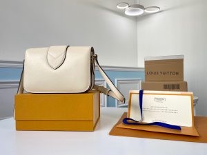 LOUIS VUITTON Pont 9. Authentic quality luxury bag crafted in genuine leather comes with authenticity card, dust bag and gift bag. Elevate your style with sophistication and grace. The LV Pont 9 handbag features elegantly structured and gracefully curved lines, crafted from luxurious smooth leather. A timeless House signature, the LV Circle, has been reimagined by the creative mind of Nicolas Ghesquière, embellishing both the bag's flap and the buckle of its adjustable strap. Exuding a touch of hidden elegance, the interior surprises with a colored leather lining and a Monogram Flower magnetic closure discreetly placed beneath the flap. - KRIS + KIKO LOUIS VUITTON Pont 9. Authentic quality luxury bag crafted in genuine leather comes with authenticity card, dust bag and gift bag. Elevate your style with sophistication and grace. The LV Pont 9 handbag features elegantly structured and gracefully curved lines, crafted from luxurious smooth leather. A timeless House signature, the LV Circle, has been reimagined by the creative mind of Nicolas Ghesquière, embellishing both the bag's flap and the buckle of its adjustable strap. Exuding a touch of hidden elegance, the interior surprises with a colored leather lining and a Monogram Flower magnetic closure discreetly placed beneath the flap.