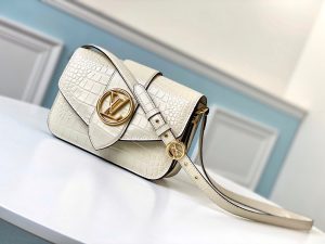 LOUIS VUITTON Pont 9. Authentic quality luxury bag crafted in genuine leather comes with authenticity card, dust bag and gift bag. Elevate your style with sophistication and grace. The LV Pont 9 handbag features elegantly structured and gracefully curved lines, crafted from luxurious smooth leather. A timeless House signature, the LV Circle, has been reimagined by the creative mind of Nicolas Ghesquière, embellishing both the bag's flap and the buckle of its adjustable strap. Exuding a touch of hidden elegance, the interior surprises with a colored leather lining and a Monogram Flower magnetic closure discreetly placed beneath the flap. - KRIS + KIKO LOUIS VUITTON Pont 9. Original Quality Bag including gift box, literature, dust bag, authenticity card. The structured yet curved lines of the LV Pont 9 handbag are fashioned from smooth leather. The LV Circle, a classic House signature reinterpreted by Nicolas Ghesquière, adorns the bag’s flap and the adjustable strap’s buckle. Hidden features such as a colored leather lining and Monogram Flower magnetic closure on the flap’s underside bring subtle sophistication.