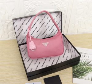 PRADA Re-Edition 2000 Nylon Mini Hobo. Authentic quality luxury bag crafted in genuine leather comes with authenticity card, dust bag and gift bag. Embrace practical femininity. The nylon mini bag is both practical and feminine, beautifully adorned with iconic Saffiano leather trim. This exquisite accessory showcases a tasteful combination of contemporary materials. - KRIS + KIKO PRADA Re-Edition 2000 Nylon Mini Hobo. Authentic quality luxury bag crafted in genuine leather comes with authenticity card, dust bag and gift bag. Embrace practical femininity. The nylon mini bag is both practical and feminine, beautifully adorned with iconic Saffiano leather trim. This exquisite accessory showcases a tasteful combination of contemporary materials.