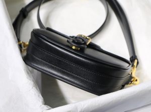 DIOR Small Bobby Bag. Authentic quality luxury bag crafted in genuine leather comes with authenticity card, dust bag and gift bag. Functionality Meets Elegance in Perfect Harmony. Maria Grazia Chiuri has introduced a new addition to the prestigious French fashion house's collection of iconic bags: the Dior Bobby. This stylish bag pays tribute to the owner's beloved pet pooch and showcases a new silhouette that resembles the D-fence bag, featuring the timeless CD logo. The Dior Bobby is the epitome of functionality and elegance, providing the perfect size for fashionable individuals who want to make a statement. With its practical shoulder strap, this sassy bag is perfectly suited to meet the demands of modern life. Its feminine curves and discreet "30 Montaigne" inscription on the back serve as a gentle nod to the renowned symbolic bag that shares its name. - KRIS + KIKO DIOR Small Bobby Bag. Original Quality Bag, including gift box, literature, dust bag, authenticity card. Maria Grazia Chiuri introduced a new silhouette to the French fashion house’s repertoire of It bags: the Dior Bobby which pays homage to the lovely pooch of the master himself. The Dior Bobby is a rounded flap that is similar to the D-fence bag with the classic CD logo. Got to admit, Bobby offers the best size for a bag that’s meant to be functional, easy to strut around in while looking like a million bucks. The Dior Bobby is a sassy shoulder bag that’s well suited for today’s call for practicality. Its feminine curve and the ‘30 Montaigne’ address on the back, renders a subtle echo of the eponymous symbolic bag.