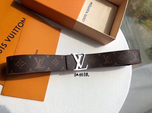 LOUIS VUITTON LV Initiales Belt 40 mm. Authentic quality luxury belt crafted in genuine leather comes with authenticity card, dust bag and gift bag. Unveiling a Striking Dichotomy of Elegance and Urbanity. Adorned with the signature Damier Cobalt canvas, the LV Initiales 40mm Reversible Belt effortlessly blends sophistication with an urban touch by seamlessly merging plain calf leather and iconic House motifs. Flaunting a versatile design, the plain leather side exudes a refined elegance suitable for formal business affairs. On the flip side, the striking Damier or Monogram canvas amplifies the belt's metropolitan allure, making it an ideal choice for a contemporary and fashion-forward look.