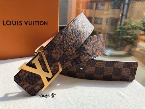 LOUIS VUITTON LV Initiales Belt 40 mm. Authentic quality luxury belt crafted in genuine leather comes with authenticity card, dust bag and gift bag. Unveiling a Striking Dichotomy of Elegance and Urbanity. Adorned with the signature Damier Cobalt canvas, the LV Initiales 40mm Reversible Belt effortlessly blends sophistication with an urban touch by seamlessly merging plain calf leather and iconic House motifs. Flaunting a versatile design, the plain leather side exudes a refined elegance suitable for formal business affairs. On the flip side, the striking Damier or Monogram canvas amplifies the belt's metropolitan allure, making it an ideal choice for a contemporary and fashion-forward look.