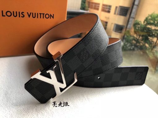 LOUIS VUITTON LV Initiales Belt 40 mm. Authentic quality luxury belt crafted in genuine leather comes with authenticity card, dust bag and gift bag. Unveiling a Striking Dichotomy of Elegance and Urbanity. Adorned with the signature Damier Cobalt canvas, the LV Initiales 40mm Reversible Belt effortlessly blends sophistication with an urban touch by seamlessly merging plain calf leather and iconic House motifs. Flaunting a versatile design, the plain leather side exudes a refined elegance suitable for formal business affairs. On the flip side, the striking Damier or Monogram canvas amplifies the belt's metropolitan allure, making it an ideal choice for a contemporary and fashion-forward look.