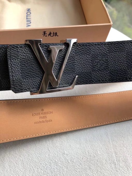 LOUIS VUITTON LV Initiales Belt 40 mm. Authentic quality luxury belt crafted in genuine leather comes with authenticity card, dust bag and gift bag. Unveiling a Striking Dichotomy of Elegance and Urbanity. Adorned with the signature Damier Cobalt canvas, the LV Initiales 40mm Reversible Belt effortlessly blends sophistication with an urban touch by seamlessly merging plain calf leather and iconic House motifs. Flaunting a versatile design, the plain leather side exudes a refined elegance suitable for formal business affairs. On the flip side, the striking Damier or Monogram canvas amplifies the belt's metropolitan allure, making it an ideal choice for a contemporary and fashion-forward look.