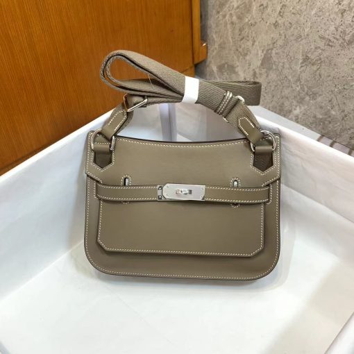HERMÈS Jypsiere Mini Bag. Authentic quality luxury bag crafted in genuine leather comes with authenticity card, dust bag and gift bag. Embrace Wanderlust with the Jypsière - Where Bohemian Chic Meets Timeless Adventure. The Jypsière, a charming combination of a bohemian saddlebag and a gipsy game-bag, skillfully blends the timeless appeal of a hunting bag with the iconic Birkin style. Featuring convenient pockets and detachable straps, along with its distinctive girths and tabs, this whimsical accessory is perfect for globetrotters who love to let their imagination roam freely.