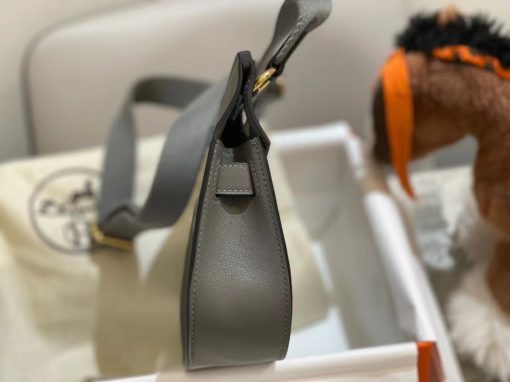 HERMÈS Jypsiere Mini Bag. Authentic quality luxury bag crafted in genuine leather comes with authenticity card, dust bag and gift bag. Embrace Wanderlust with the Jypsière - Where Bohemian Chic Meets Timeless Adventure. The Jypsière, a charming combination of a bohemian saddlebag and a gipsy game-bag, skillfully blends the timeless appeal of a hunting bag with the iconic Birkin style. Featuring convenient pockets and detachable straps, along with its distinctive girths and tabs, this whimsical accessory is perfect for globetrotters who love to let their imagination roam freely.