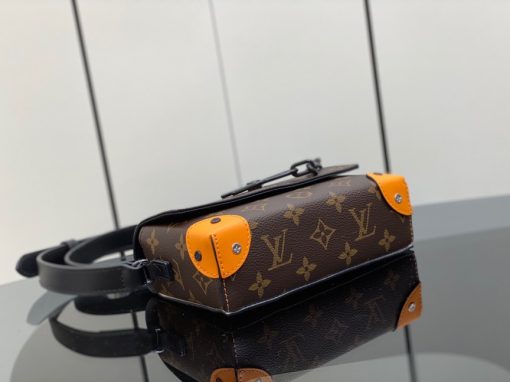 LOUIS VUITTON Steamer Wearable Wallet.  Authentic quality luxury wallet crafted in genuine leather comes with authenticity card, dust bag and gift bag. Style meets function: Elevate your everyday. The Steamer Wearable Wallet is a tasteful creation that draws inspiration from the timeless design codes of classic Steamer bags. Crafted with utmost precision, this wallet is constructed with durable Monogram Macassar canvas and features reinforced saffron leather corners for added strength. The use of black metal hardware, including rivets on the corners and a steamer-style chain, adds a touch of elegance to this piece. Rest assured, your valuables will be kept safe and organized with the inclusion of an inside zipped pocket.