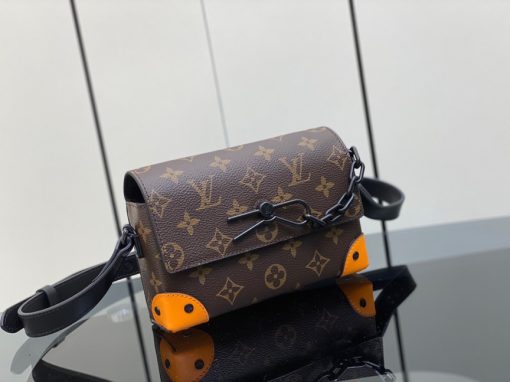 LOUIS VUITTON Steamer Wearable Wallet.  Authentic quality luxury wallet crafted in genuine leather comes with authenticity card, dust bag and gift bag. Style meets function: Elevate your everyday. The Steamer Wearable Wallet is a tasteful creation that draws inspiration from the timeless design codes of classic Steamer bags. Crafted with utmost precision, this wallet is constructed with durable Monogram Macassar canvas and features reinforced saffron leather corners for added strength. The use of black metal hardware, including rivets on the corners and a steamer-style chain, adds a touch of elegance to this piece. Rest assured, your valuables will be kept safe and organized with the inclusion of an inside zipped pocket.