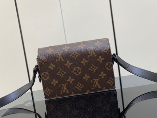 LOUIS VUITTON Steamer Wearable Wallet.  Authentic quality luxury wallet crafted in genuine leather comes with authenticity card, dust bag and gift bag. Style meets function: Elevate your everyday. The Steamer Wearable Wallet is a tasteful creation that draws inspiration from the timeless design codes of classic Steamer bags. Crafted with utmost precision, this wallet is constructed with durable Monogram Macassar canvas and features reinforced saffron leather corners for added strength. The use of black metal hardware, including rivets on the corners and a steamer-style chain, adds a touch of elegance to this piece. Rest assured, your valuables will be kept safe and organized with the inclusion of an inside zipped pocket.