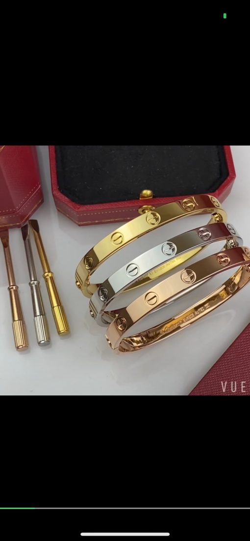 CARTIER Love Bracelet. Authentic quality luxury jewelry comes with authenticity card, dust bag and gift bag. Embrace Eternal Loyalty with Uniquely Stunning Style. This exquisite bracelet beautifully symbolizes loyalty towards your beloved. Its distinctive locking mechanism, requiring a miniature screwdriver, renders it truly one-of-a-kind, making it the ideal gift for your significant other. Renowned for its iconic screws and signature oval shape, the LOVE Bracelet is certain to hold a cherished position in your heart. This remarkable piece of jewelry can effortlessly adorn you day and night, demonstrating its timeless allure.