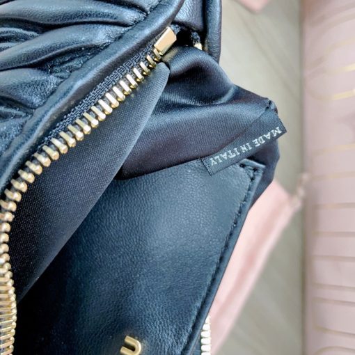 MIU MIU Matelassé Shoulder Bag. Authentic quality luxury bag crafted in genuine leather comes with authenticity card, dust bag and gift bag. Elevate your style with sophistication and craftsmanship. The exquisite matelassé technique exudes elegance and creates a visually captivating, multi-dimensional effect on this nappa leather shoulder bag. The beautifully crafted logo, reflecting the various metallic finishes of the hardware, effortlessly catches the eye, adding a touch of distinction to the immaculate artisanal work. Both functional and aesthetically pleasing, the detachable chain and leather shoulder straps perfectly meet your needs.