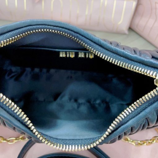 MIU MIU Matelassé Shoulder Bag. Authentic quality luxury bag crafted in genuine leather comes with authenticity card, dust bag and gift bag. Elevate your style with sophistication and craftsmanship. The exquisite matelassé technique exudes elegance and creates a visually captivating, multi-dimensional effect on this nappa leather shoulder bag. The beautifully crafted logo, reflecting the various metallic finishes of the hardware, effortlessly catches the eye, adding a touch of distinction to the immaculate artisanal work. Both functional and aesthetically pleasing, the detachable chain and leather shoulder straps perfectly meet your needs.