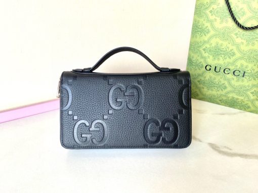 GUCCI Jumbo GG Travel Document Case. Authentic quality luxury bag crafted in genuine leather comes with authenticity card, dust bag and gift bag. Embrace Timeless Luxury: Secure Your Journey with Iconic GG Document Case. The iconic GG design makes a comeback for Pre-Fall 2023, adorning a range of small leather items. Paying homage to Guccio Gucci's initials, this motif remains timeless for the brand, showcased prominently in a large size to create a striking logo effect. In this particular case, the emblematic leather defines a travel document holder, ensuring security with a zip closure.