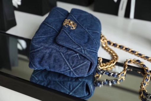 Chanel '19' Flap Bag in Blue Denim 2020. Original Quality Bag including gift box, care book, dust bag, authenticity card. This gorgeous Chanel '19' Flap Bag in Blue Denim is the most sought after bag this year by CHANEL. Gorgeous and so on-trend. Guaranteed authentic and comes with proof of purchase! Please be advised that this is the Larger size, not the medium. Sold out globally. This style is no longer available from Chanel and discontinued in denim. A great investment piece.