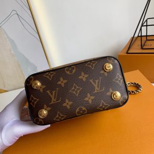 LOUIS VUITTON Vanity PM Case. Authentic quality luxury bag crafted in genuine leather comes with authenticity card, dust bag and gift bag. Elevate your style and embrace the spirit of travel with the revamped Nice Vanity Kit. Nicolas Ghesquière's vision for 2020 brings a delightful tribute to LOUIS VUITTON's timeless travel legacy. Behold, an exquisite reinvention of the classic Nice vanity kit, transformed into a chic city bag crafted with Monogram and Monogram Reverse canvases. This masterpiece is designed to be effortlessly portable, boasting a lightweight and supple structure that allows it to accompany you wherever you go. The bag can be gracefully carried in your hand, elegantly slung over your shoulder, or worn across your body, thanks to its removable leather-chain strap. - KRIS + KIKO LOUIS VUITTON Vanity PM Case. Authentic quality luxury bag crafted in genuine leather comes with authenticity card, dust bag and gift bag. Elevate your style and embrace the spirit of travel with the revamped Nice Vanity Kit. Nicolas Ghesquière's vision for 2020 brings a delightful tribute to LOUIS VUITTON's timeless travel legacy. Behold, an exquisite reinvention of the classic Nice vanity kit, transformed into a chic city bag crafted with Monogram and Monogram Reverse canvases. This masterpiece is designed to be effortlessly portable, boasting a lightweight and supple structure that allows it to accompany you wherever you go. The bag can be gracefully carried in your hand, elegantly slung over your shoulder, or worn across your body, thanks to its removable leather-chain strap.