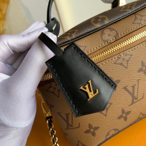 LOUIS VUITTON Vanity PM Case. Authentic quality luxury bag crafted in genuine leather comes with authenticity card, dust bag and gift bag. Elevate your style and embrace the spirit of travel with the revamped Nice Vanity Kit. Nicolas Ghesquière's vision for 2020 brings a delightful tribute to LOUIS VUITTON's timeless travel legacy. Behold, an exquisite reinvention of the classic Nice vanity kit, transformed into a chic city bag crafted with Monogram and Monogram Reverse canvases. This masterpiece is designed to be effortlessly portable, boasting a lightweight and supple structure that allows it to accompany you wherever you go. The bag can be gracefully carried in your hand, elegantly slung over your shoulder, or worn across your body, thanks to its removable leather-chain strap. - KRIS + KIKO LOUIS VUITTON Vanity PM Case. Authentic quality luxury bag crafted in genuine leather comes with authenticity card, dust bag and gift bag. Elevate your style and embrace the spirit of travel with the revamped Nice Vanity Kit. Nicolas Ghesquière's vision for 2020 brings a delightful tribute to LOUIS VUITTON's timeless travel legacy. Behold, an exquisite reinvention of the classic Nice vanity kit, transformed into a chic city bag crafted with Monogram and Monogram Reverse canvases. This masterpiece is designed to be effortlessly portable, boasting a lightweight and supple structure that allows it to accompany you wherever you go. The bag can be gracefully carried in your hand, elegantly slung over your shoulder, or worn across your body, thanks to its removable leather-chain strap.
