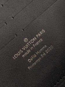 LOUIS VUITTON Soft Trunk Clutch. Authentic quality luxury bag crafted in genuine leather comes with authenticity card, dust bag and gift bag. Practical elegance for the modern gentleman. Introducing the sleek Soft Trunk Clutch designed specifically for men. Meticulously crafted from luxurious black Taurillon leather, this exquisite accessory features an embossed Monogram pattern. Boasting a refined rectilinear form and compact dimensions, it effortlessly accommodates your essential items such as a phone, earbuds, and credit cards. With a wide zipped opening for easy access and a removable wristband, it provides utmost practicality and convenience. - KRIS + KIKO LOUIS VUITTON Soft Trunk Clutch. Original Quality Clutch including gift box, care book, dust bag, authenticity card. The Soft Trunk Clutch for men is fashioned from black Taurillon leather, embossed with the Monogram pattern. Its rectilinear form and compact dimensions make it perfect for carrying small essentials such as a phone, earbuds and credit cards. The wide zipped opening and removable wristband make it practical.