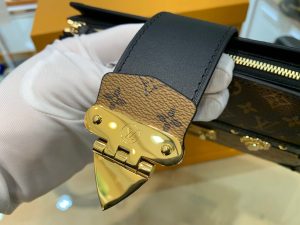 LOUIS VUITTON Trunk Clutch. Authentic quality luxury bag crafted in genuine leather comes with authenticity card, dust bag and gift bag. Style meets functionality in perfect harmony. The Trunk Clutch, designed with a soft-sided silhouette, pays homage to the rich heritage of the House, showcasing exquisite details reminiscent of the iconic LOUIS VUITTON luggage. Crafted in supple yet firm Monogram and Monogram Reverse canvas, this clutch effortlessly combines style with practicality, offering ample space to carry your everyday essentials. Its lightweight nature adds to its charm, making it an essential accessory. Additionally, the clutch features a detachable chain-and-leather strap, providing you with multiple carrying options for this fashionable and distinctive masterpiece. - KRIS + KIKO LOUIS VUITTON Trunk Clutch. Original Quality Clutch including gift box, care book, dust bag, authenticity card. The soft-sided LOUIS VUITTON Trunk Clutch nods to House heritage with a host of details inspired by Louis Vuitton luggage. Supple yet structured, in Monogram and Monogram Reverse canvas, it is also lightweight, with room enough for everyday essentials. A removable chain-and-leather strap multiplies the carry options for this trendy, signature piece.