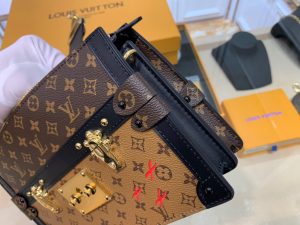 LOUIS VUITTON Trunk Clutch. Authentic quality luxury bag crafted in genuine leather comes with authenticity card, dust bag and gift bag. Style meets functionality in perfect harmony. The Trunk Clutch, designed with a soft-sided silhouette, pays homage to the rich heritage of the House, showcasing exquisite details reminiscent of the iconic LOUIS VUITTON luggage. Crafted in supple yet firm Monogram and Monogram Reverse canvas, this clutch effortlessly combines style with practicality, offering ample space to carry your everyday essentials. Its lightweight nature adds to its charm, making it an essential accessory. Additionally, the clutch features a detachable chain-and-leather strap, providing you with multiple carrying options for this fashionable and distinctive masterpiece. - KRIS + KIKO LOUIS VUITTON Trunk Clutch. Authentic quality luxury bag crafted in genuine leather comes with authenticity card, dust bag and gift bag. Style meets functionality in perfect harmony. The Trunk Clutch, designed with a soft-sided silhouette, pays homage to the rich heritage of the House, showcasing exquisite details reminiscent of the iconic LOUIS VUITTON luggage. Crafted in supple yet firm Monogram and Monogram Reverse canvas, this clutch effortlessly combines style with practicality, offering ample space to carry your everyday essentials. Its lightweight nature adds to its charm, making it an essential accessory. Additionally, the clutch features a detachable chain-and-leather strap, providing you with multiple carrying options for this fashionable and distinctive masterpiece.