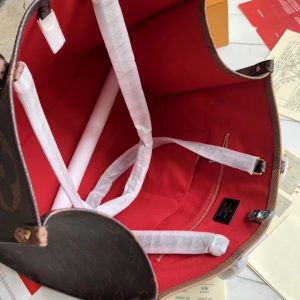 LOUIS VUITTON Onthego Monogram Tote Bag. Authentic quality luxury bag crafted in genuine leather comes with authenticity card, dust bag and gift bag. Style Meets Versatility. The precisely named Onthego tote bag effortlessly accompanies you for shopping, work, or a weekend getaway. Its spacious interior paired with the striking combination of an oversized Monogram pattern and Mini Monogram trim makes a bold fashion statement. The bag's Articulated Toron handles and two shoulder straps guarantee a comfortably stylish carry throughout the day. - KRIS + KIKO LOUIS VUITTON Onthego Monogram Tote Bag. Authentic quality luxury bag crafted in genuine leather comes with authenticity card, dust bag and gift bag. Style Meets Versatility. The precisely named Onthego tote bag effortlessly accompanies you for shopping, work, or a weekend getaway. Its spacious interior paired with the striking combination of an oversized Monogram pattern and Mini Monogram trim makes a bold fashion statement. The bag's Articulated Toron handles and two shoulder straps guarantee a comfortably stylish carry throughout the day.