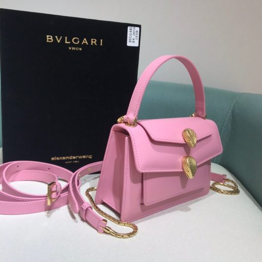 ALEXANDER WANG x BVLGARI Belt Bag. Authentic quality luxury bag crafted in genuine leather comes with authenticity card, dust bag and gift bag. Unleash your style with the versatile elegance. The belt bag is incredibly versatile and easy to incorporate into any outfit. With its two detachable straps and handle, it can be worn on the waist, as a crossbody bag, as a clutch, or over the shoulder. BVLGARI and ALEXANDER WANG have teamed up again for 2020 to bring us a new edition of Serpenti Through The Eyes of ALEXANDER WANG. This collaboration may seem unexpected at first, but the two renowned fashion houses have joined forces to create a captivating collection that combines elegance with cutting-edge design.