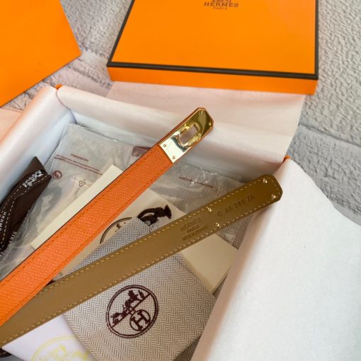 HERMÈS Kelly 18 Belt. Authentic quality luxury belt crafted in genuine leather comes with authenticity card, dust bag and gift bag.Style and versatility, redefined with adjustable elegance. The assortment of these versatile belts, designed to accommodate all sizes, adds a refreshing touch to iconic Hermes accessories with ingenious jewel clasps. With the aid of a clever sliding mechanism, this belt crafted for one-size-fits-most can be effortlessly worn around the waist or stylishly positioned on the hips.