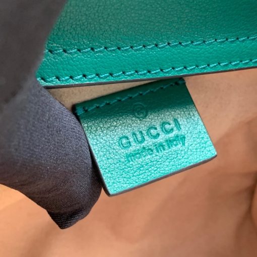 GUCCI Diana Mini Tote Bag. Authentic quality luxury bag crafted in genuine leather comes with authenticity card, dust bag and gift bag. Exquisite Style, Iconic Elements, and a Playful Twist The mini tote bag beautifully blends iconic features of the House, with its bamboo handles and Double G hardware. Crafted from luxurious leather, this accessory is made even more eye-catching with the addition of two vibrant neon bands. These bands playfully allude to the ones traditionally used to maintain the handles' shape.