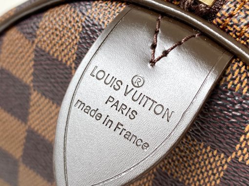 LOUIS VUITTON Speedy 30. Authentic quality luxury bag crafted in genuine leather comes with authenticity card, dust bag and gift bag. The Iconic Companion for Stylish City Life. The LV Speedy 30 is a sophisticated and compact handbag crafted from the renowned Monogram canvas. It serves as a fashionable companion for navigating city life with elegance. Originally introduced in 1930 under the name "Express," this iconic bag draws inspiration from the fast-paced transportation of that era. The modernized Speedy preserves its timeless status as a signature House icon, boasting a distinctive silhouette, delicately rolled leather handles, and a beautifully engraved signature padlock.