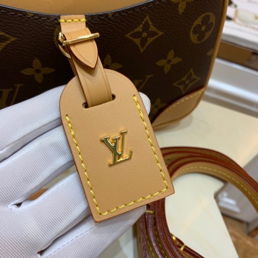 LOUIS VUITTON Deauville Mini Monogram Canvas. Authentic quality luxury bag crafted in genuine leather comes with authenticity card, dust bag and gift bag. Timeless Retro-Chic: Rediscover elegance. Nicolas Ghesquière unveiled the elegant LV Deauville Mini handbag as a captivating iteration of the iconic Deauville bag by LOUIS VUITTON. Crafted in Monogram canvas, this delightful camera bag showcases a blend of nostalgia and sophistication with its natural leather accents. Possessing a compact and lightweight design, it also offers versatility with its adjustable leather strap for effortless shoulder or cross-body carrying.