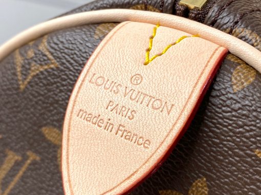 LOUIS VUITTON Speedy 30. Authentic quality luxury bag crafted in genuine leather comes with authenticity card, dust bag and gift bag. The Iconic Companion for Stylish City Life. The LV Speedy 30 is a sophisticated and compact handbag crafted from the renowned Monogram canvas. It serves as a fashionable companion for navigating city life with elegance. Originally introduced in 1930 under the name "Express," this iconic bag draws inspiration from the fast-paced transportation of that era. The modernized Speedy preserves its timeless status as a signature House icon, boasting a distinctive silhouette, delicately rolled leather handles, and a beautifully engraved signature padlock.