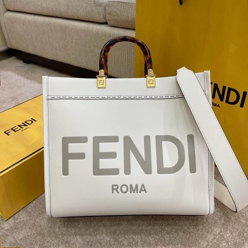 FENDI Sunshine Medium Tote. Original Quality Bag including gift box, care book, dust bag, authenticity card. Equipped with a spacious lined internal compartment, edges in tone on tone leather, and gold-finish hardware. Can be carried by hand or worn on the shoulder thanks to the two handles and detachable shoulder strap.