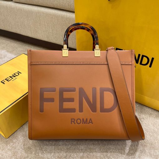 FENDI Sunshine Medium Tote. Original Quality Bag including gift box, care book, dust bag, authenticity card. Equipped with a spacious lined internal compartment, edges in tone on tone leather, and gold-finish hardware. Can be carried by hand or worn on the shoulder thanks to the two handles and detachable shoulder strap.