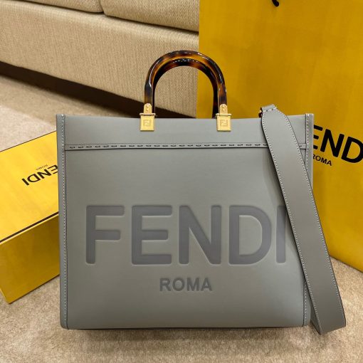 FENDI Sunshine Medium Tote. Original Quality Bag including gift box, care book, dust bag, authenticity card. Equipped with a spacious lined internal compartment, edges in tone on tone leather, and gold-finish hardware. Can be carried by hand or worn on the shoulder thanks to the two handles and detachable shoulder strap.