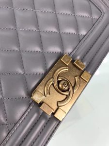 CHANEL 'Boy' Diamond Quilted Leather Flap Bag. Authentic quality luxury bag crafted in genuine leather comes with authenticity card, dust bag and gift bag. Embrace timeless elegance. The Chanel Boy Flap Bag Quilted, a creation by the visionary Karl Lagerfeld, pays tribute to Gabrielle Chanel's beloved Boy Capel. This exquisite bag, reminiscent of every woman's fantasy, is meticulously crafted from premium calfskin leather. It showcases Chanel's iconic diamond quilting, adorned with a bold chain link strap enhanced by a leather shoulder pad, and complemented by delicate metal-tone hardware accents. The bag's CC Boy logo closure gracefully reveals a fabric-lined interior, complete with a convenient slip pocket to house everyday essentials. Truly a cherished and opulent accessory coveted by many. - KRIS + KIKO CHANEL 'Boy' Diamond Quilted Leather Flap Bag. Authentic quality luxury bag crafted in genuine leather comes with authenticity card, dust bag and gift bag. Embrace timeless elegance. The Chanel Boy Flap Bag Quilted, a creation by the visionary Karl Lagerfeld, pays tribute to Gabrielle Chanel's beloved Boy Capel. This exquisite bag, reminiscent of every woman's fantasy, is meticulously crafted from premium calfskin leather. It showcases Chanel's iconic diamond quilting, adorned with a bold chain link strap enhanced by a leather shoulder pad, and complemented by delicate metal-tone hardware accents. The bag's CC Boy logo closure gracefully reveals a fabric-lined interior, complete with a convenient slip pocket to house everyday essentials. Truly a cherished and opulent accessory coveted by many.