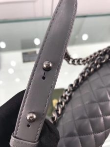 CHANEL 'Boy' Diamond Quilted Leather Flap Bag. Authentic quality luxury bag crafted in genuine leather comes with authenticity card, dust bag and gift bag. Embrace timeless elegance. The Chanel Boy Flap Bag Quilted, a creation by the visionary Karl Lagerfeld, pays tribute to Gabrielle Chanel's beloved Boy Capel. This exquisite bag, reminiscent of every woman's fantasy, is meticulously crafted from premium calfskin leather. It showcases Chanel's iconic diamond quilting, adorned with a bold chain link strap enhanced by a leather shoulder pad, and complemented by delicate metal-tone hardware accents. The bag's CC Boy logo closure gracefully reveals a fabric-lined interior, complete with a convenient slip pocket to house everyday essentials. Truly a cherished and opulent accessory coveted by many. - KRIS + KIKO CHANEL 'Boy' Diamond Quilted Leather Flap Bag. Original Quality Bag including gift box, care book, dust bag, authenticity card. Created by Karl Lagerfeld, the iconic design owes its name to Gabrielle Chanel's first love, Boy Capel. This Chanel Boy Flap Bag Quilted is every woman's dream. Crafted from calfskin leather, the bag features Chanel's signature diamond quilting, chunky chain link strap with leather shoulder pad, and metal-tone hardware accents. Its CC Boy logo closure opens to a fabric-lined interior with slip pocket perfect for daily essentials. A sought-after, luxurious accessory.