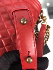 CHANEL 'Boy' Diamond Quilted Leather Flap Bag. Authentic quality luxury bag crafted in genuine leather comes with authenticity card, dust bag and gift bag. Embrace timeless elegance. The Chanel Boy Flap Bag Quilted, a creation by the visionary Karl Lagerfeld, pays tribute to Gabrielle Chanel's beloved Boy Capel. This exquisite bag, reminiscent of every woman's fantasy, is meticulously crafted from premium calfskin leather. It showcases Chanel's iconic diamond quilting, adorned with a bold chain link strap enhanced by a leather shoulder pad, and complemented by delicate metal-tone hardware accents. The bag's CC Boy logo closure gracefully reveals a fabric-lined interior, complete with a convenient slip pocket to house everyday essentials. Truly a cherished and opulent accessory coveted by many. - KRIS + KIKO CHANEL 'Boy' Diamond Quilted Leather Flap Bag. Authentic quality luxury bag crafted in genuine leather comes with authenticity card, dust bag and gift bag. Embrace timeless elegance. The Chanel Boy Flap Bag Quilted, a creation by the visionary Karl Lagerfeld, pays tribute to Gabrielle Chanel's beloved Boy Capel. This exquisite bag, reminiscent of every woman's fantasy, is meticulously crafted from premium calfskin leather. It showcases Chanel's iconic diamond quilting, adorned with a bold chain link strap enhanced by a leather shoulder pad, and complemented by delicate metal-tone hardware accents. The bag's CC Boy logo closure gracefully reveals a fabric-lined interior, complete with a convenient slip pocket to house everyday essentials. Truly a cherished and opulent accessory coveted by many.