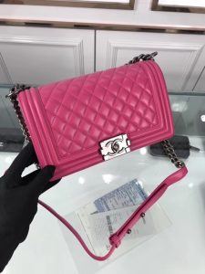 CHANEL 'Boy' Diamond Quilted Leather Flap Bag. Authentic quality luxury bag crafted in genuine leather comes with authenticity card, dust bag and gift bag. Embrace timeless elegance. The Chanel Boy Flap Bag Quilted, a creation by the visionary Karl Lagerfeld, pays tribute to Gabrielle Chanel's beloved Boy Capel. This exquisite bag, reminiscent of every woman's fantasy, is meticulously crafted from premium calfskin leather. It showcases Chanel's iconic diamond quilting, adorned with a bold chain link strap enhanced by a leather shoulder pad, and complemented by delicate metal-tone hardware accents. The bag's CC Boy logo closure gracefully reveals a fabric-lined interior, complete with a convenient slip pocket to house everyday essentials. Truly a cherished and opulent accessory coveted by many. - KRIS + KIKO CHANEL 'Boy' Diamond Quilted Leather Flap Bag. Original Quality Bag including gift box, care book, dust bag, authenticity card. Created by Karl Lagerfeld, the iconic design owes its name to Gabrielle Chanel's first love, Boy Capel. This Chanel Boy Flap Bag Quilted is every woman's dream. Crafted from calfskin leather, the bag features Chanel's signature diamond quilting, chunky chain link strap with leather shoulder pad, and metal-tone hardware accents. Its CC Boy logo closure opens to a fabric-lined interior with slip pocket perfect for daily essentials. A sought-after, luxurious accessory.