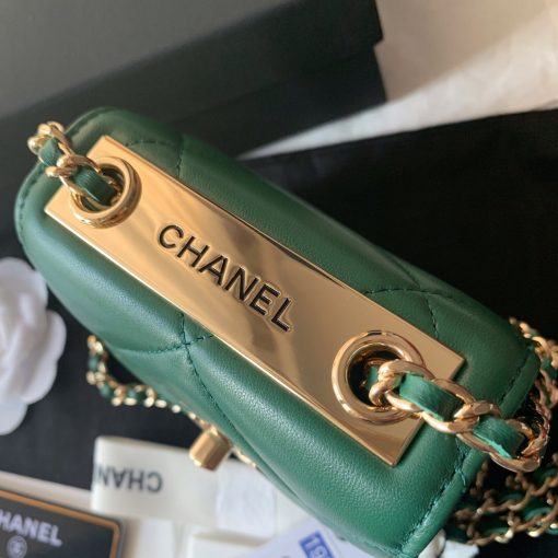 CHANEL Mini CC Clutch with Chain. Authentic quality luxury bag crafted in genuine leather comes with authenticity card, dust bag and gift bag. Luxury meets sophistication. Introducing the CHANEL CC Clutch with Chain - a sophisticated and trendy accessory crafted with utmost care from luxurious quilted lambskin leather. This exquisite clutch showcases a beautifully woven leather chain strap, along with a flawless logo metal plate and aged gold-tone hardware. Unlock its elegance with a convenient turn-lock closure, revealing a refined black fabric interior adorned with practical slip pockets.