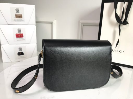 GUCCI 1955 Horsebit Shoulder Bag. Authentic quality luxury bag crafted in genuine leather comes with authenticity card, dust bag and gift bag. Timeless Design, Modern Spirit. The Gucci Horsebit 1955 bag, introduced for Cruise 2020, is a reimagined version of an archival design. This accessory combines classic elements with a modern twist, showcasing the iconic Horsebit hardware. The bag features a small flap shoulder design with an adjustable strap, allowing for versatile wear. It is crafted with Gucci's monogram fabric and embodies the individual spirit of the House.