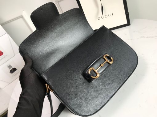 GUCCI 1955 Horsebit Shoulder Bag. Authentic quality luxury bag crafted in genuine leather comes with authenticity card, dust bag and gift bag. Timeless Design, Modern Spirit. The Gucci Horsebit 1955 bag, introduced for Cruise 2020, is a reimagined version of an archival design. This accessory combines classic elements with a modern twist, showcasing the iconic Horsebit hardware. The bag features a small flap shoulder design with an adjustable strap, allowing for versatile wear. It is crafted with Gucci's monogram fabric and embodies the individual spirit of the House.