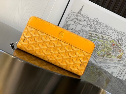 GOYARD Matignon GM Wallet. Authentic quality luxury bag crafted in genuine leather comes with authenticity card, dust bag and gift bag. A Statement of Elegance and Functionality. Experience luxury and functionality with the Goyard Matignon GM Wallet. Crafted from premium calf leather and Goyardine canvas, it offers twelve card slots, a zipper pocket, and two spacious compartments, all secured by a snap button closure. Handcrafted by skilled artisans, Whether you're running errands or gracing a formal occasion, this wallet is the ultimate style companion. Choose from an array of colors to reflect your personality and elevate your ensemble. With this wallet, you'll not only radiate elegance but also experience unparalleled functionality.