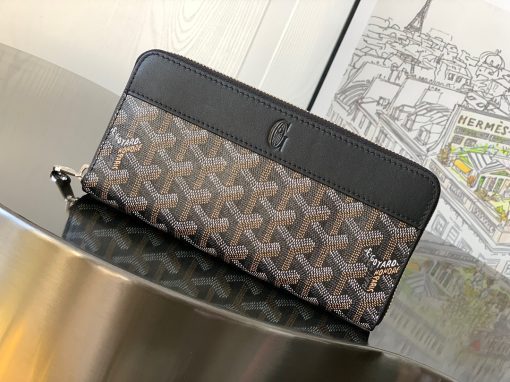 GOYARD Matignon GM Wallet. Authentic quality luxury bag crafted in genuine leather comes with authenticity card, dust bag and gift bag. A Statement of Elegance and Functionality. Experience luxury and functionality with the Goyard Matignon GM Wallet. Crafted from premium calf leather and Goyardine canvas, it offers twelve card slots, a zipper pocket, and two spacious compartments, all secured by a snap button closure. Handcrafted by skilled artisans, Whether you're running errands or gracing a formal occasion, this wallet is the ultimate style companion. Choose from an array of colors to reflect your personality and elevate your ensemble. With this wallet, you'll not only radiate elegance but also experience unparalleled functionality.