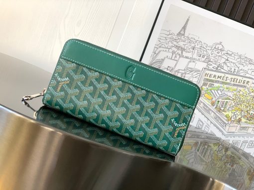 GOYARD Matignon GM Wallet. Authentic quality luxury bag crafted in genuine leather comes with authenticity card, dust bag and gift bag. A Statement of Elegance and Functionality. Experience luxury and functionality with the Goyard Matignon GM Wallet. Crafted from premium calf leather and Goyardine canvas, it offers twelve card slots, a zipper pocket, and two spacious compartments, all secured by a snap button closure. Handcrafted by skilled artisans, Whether you're running errands or gracing a formal occasion, this wallet is the ultimate style companion. Choose from an array of colors to reflect your personality and elevate your ensemble. With this wallet, you'll not only radiate elegance but also experience unparalleled functionality.
