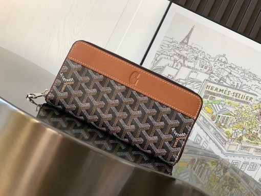 GOYARD Matignon GM Wallet. Authentic quality luxury bag crafted in genuine leather comes with authenticity card, dust bag and gift bag. A Statement of Elegance and Functionality. Experience luxury and functionality with the Goyard Matignon GM Wallet. Crafted from premium calf leather and Goyardine canvas, it offers twelve card slots, a zipper pocket, and two spacious compartments, all secured by a snap button closure. Handcrafted by skilled artisans, Whether you're running errands or gracing a formal occasion, this wallet is the ultimate style companion. Choose from an array of colors to reflect your personality and elevate your ensemble. With this wallet, you'll not only radiate elegance but also experience unparalleled functionality.