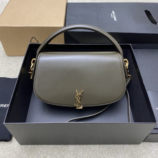 SAINT LAURENT Voltaire in Box. Authentic quality luxury bag crafted in genuine leather comes with authenticity card, dust bag and gift bag. A Twist of Modernity: Iconic Elegance. Introducing the Half-Moon Shoulder Bag – a seamless blend of elegance and modernity. Crafted in luxurious calfskin with a subtle polished finish, this chic accessory features a distinctive flap with the iconic pivoting CASSANDRE closure. Complete with an adjustable and detachable swivel-hook strap, it offers versatile carry options to suit any style. Elevate your look with this timeless masterpiece.