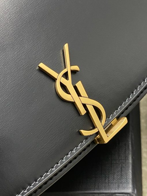 SAINT LAURENT Voltaire in Box. Authentic quality luxury bag crafted in genuine leather comes with authenticity card, dust bag and gift bag. A Twist of Modernity: Iconic Elegance. Introducing the Half-Moon Shoulder Bag – a seamless blend of elegance and modernity. Crafted in luxurious calfskin with a subtle polished finish, this chic accessory features a distinctive flap with the iconic pivoting CASSANDRE closure. Complete with an adjustable and detachable swivel-hook strap, it offers versatile carry options to suit any style. Elevate your look with this timeless masterpiece.