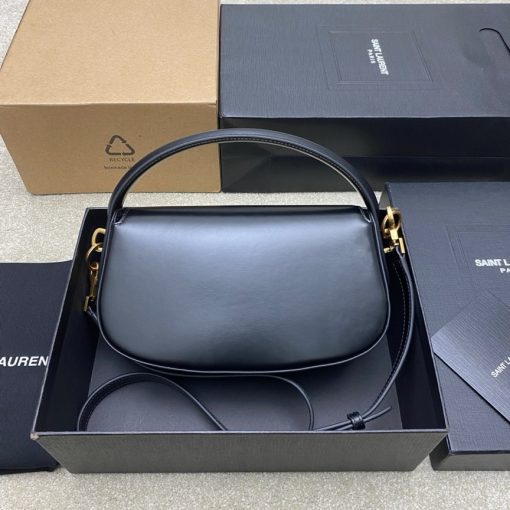 SAINT LAURENT Voltaire in Box. Authentic quality luxury bag crafted in genuine leather comes with authenticity card, dust bag and gift bag. A Twist of Modernity: Iconic Elegance. Introducing the Half-Moon Shoulder Bag – a seamless blend of elegance and modernity. Crafted in luxurious calfskin with a subtle polished finish, this chic accessory features a distinctive flap with the iconic pivoting CASSANDRE closure. Complete with an adjustable and detachable swivel-hook strap, it offers versatile carry options to suit any style. Elevate your look with this timeless masterpiece.
