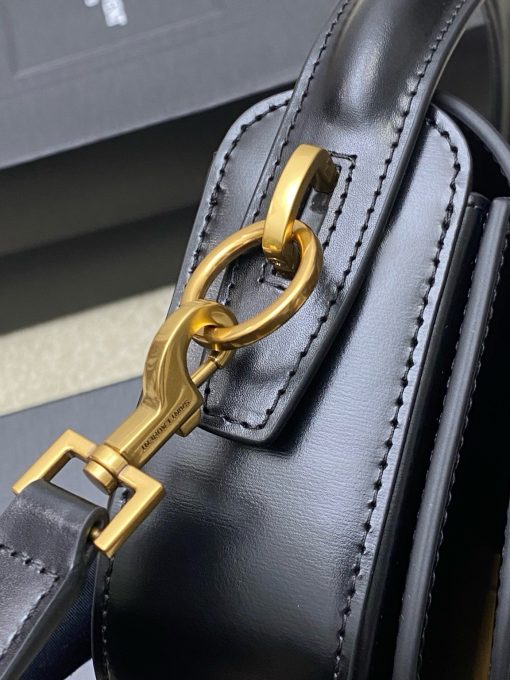 SAINT LAURENT Voltaire in Box. Authentic quality luxury bag crafted in genuine leather comes with authenticity card, dust bag and gift bag. A Twist of Modernity: Iconic Elegance. Introducing the Half-Moon Shoulder Bag – a seamless blend of elegance and modernity. Crafted in luxurious calfskin with a subtle polished finish, this chic accessory features a distinctive flap with the iconic pivoting CASSANDRE closure. Complete with an adjustable and detachable swivel-hook strap, it offers versatile carry options to suit any style. Elevate your look with this timeless masterpiece.