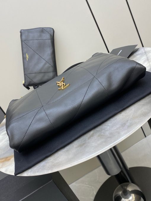 SAINT LAURENT The Jamie 4.3 Pochon. Authentic quality luxury bag crafted in genuine leather comes with authenticity card, dust bag and gift bag. Versatile elegance: style that adapts to you. Introducing the pouch version of the SAINT LAURENT Jamie 4.3, crafted from ultra-soft nappa leather with signature carré rive gauche topstitching. Designed to be both lightweight and spacious, this versatile bag features an adjustable drawstring chain for customizable carry options, along with a removable zip pouch for added convenience. Style meets function in one effortlessly chic accessory!